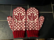 Load image into Gallery viewer, A pair of red and cream knit winter mittens featuring a maple leaf pattern